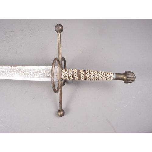 244 - A Spanish replica steel two hand broadsword, 47