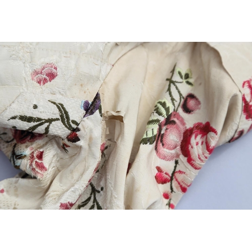 250 - A mid 18th century self-coloured and embroidered silk 