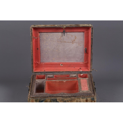 251 - A mid 17th century silk stump work and embroidered box with part fitted interior and silvered carry ... 