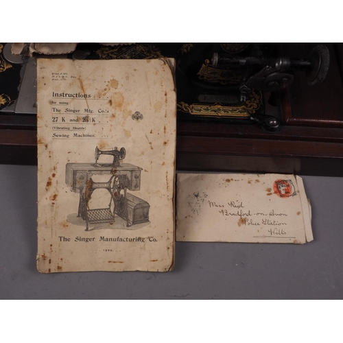 262 - A 28 C. 1900 Singer sewing machine with purchase receipt, serial number  P332514, in mahogany case