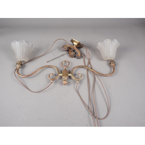 285 - A coppered brass two-light rise and fall ceiling pendant