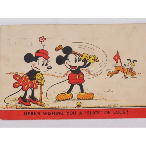 297 - A slip album of early 20th century comic postcards, including Mickey Mouse, Mable Lucie Atwell, Marg... 