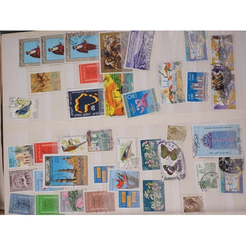 305 - A quantity of first day covers, loose stamps from around the world, a stock book and albums