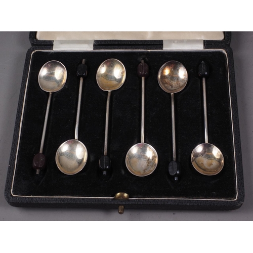 316 - A set of six silver coffee spoons, a silver 1953 Coronation spoon, in case, four silver plated coffe... 