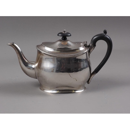 321 - A silver oval-shaped teapot with ebonised knop and handle, 14.6oz troy approx