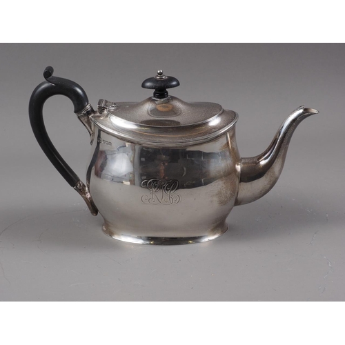 321 - A silver oval-shaped teapot with ebonised knop and handle, 14.6oz troy approx