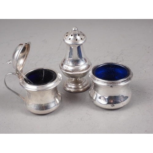 328 - A silver three-piece cruet, in case