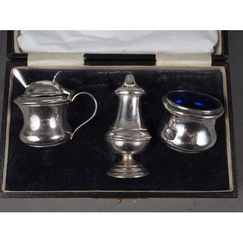 328 - A silver three-piece cruet, in case