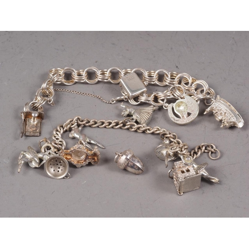 337 - Two silver charm bracelets, two silver bangles, a pair of silver cufflinks, an Armed Forces badge an... 