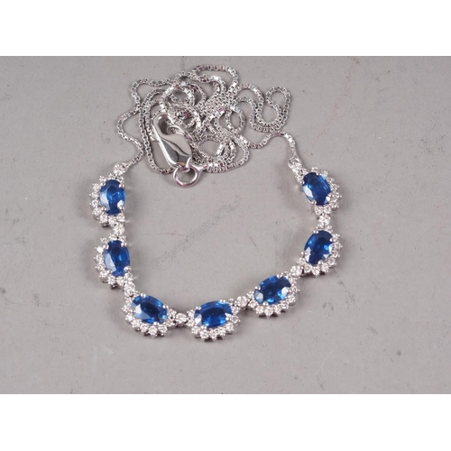 338 - An 18ct white gold diamond and sapphire necklace, 8.7g