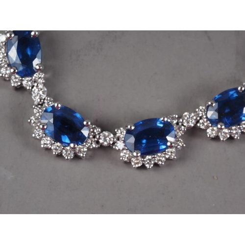 338 - An 18ct white gold diamond and sapphire necklace, 8.7g