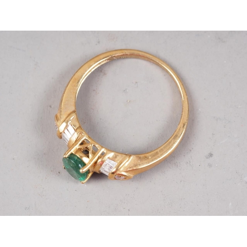 339 - An 18ct gold diamond and emerald dress ring, size N, 3.2g