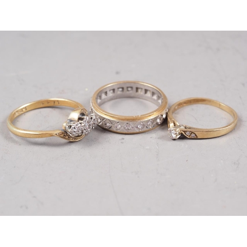 340 - A 9ct gold and diamond dress ring, size J, 1.1g, an 18ct gold and diamond crossover ring, size N, 2.... 