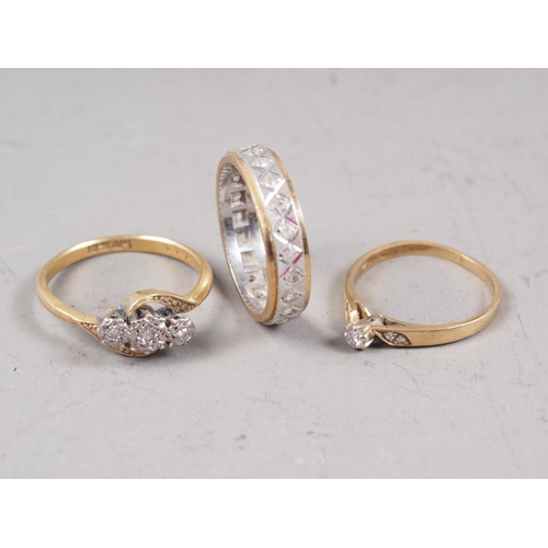 340 - A 9ct gold and diamond dress ring, size J, 1.1g, an 18ct gold and diamond crossover ring, size N, 2.... 