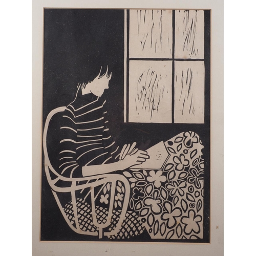 383 - A 1970s linocut, girl reading, in ebonised strip frame