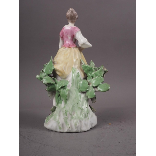 42 - An 18th century Derby figure of a girl, 7