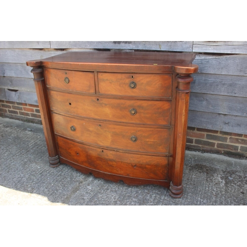 485 - A 19th century mahogany bowfront chest of two short and three long graduated drawers with flanking c... 