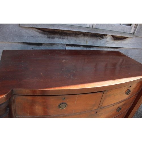 485 - A 19th century mahogany bowfront chest of two short and three long graduated drawers with flanking c... 