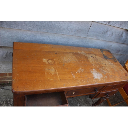 486 - A 19th century mahogany desk, fitted five drawers, on turned supports, 42