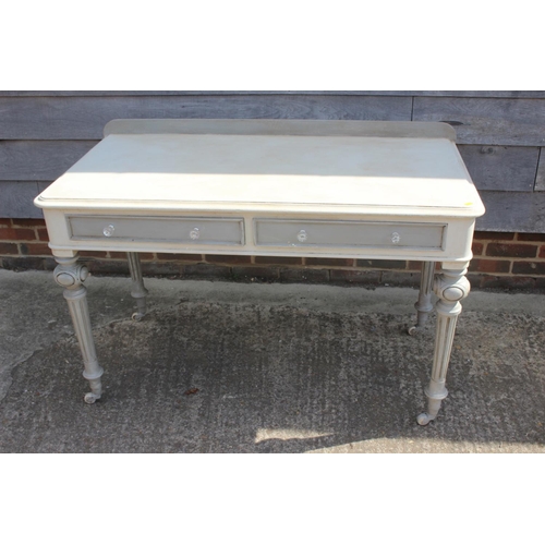 491 - A late 19th century grey painted dressing table with ledge back, fitted two drawers with glass knob ... 