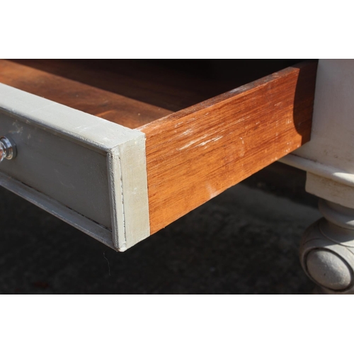 491 - A late 19th century grey painted dressing table with ledge back, fitted two drawers with glass knob ... 