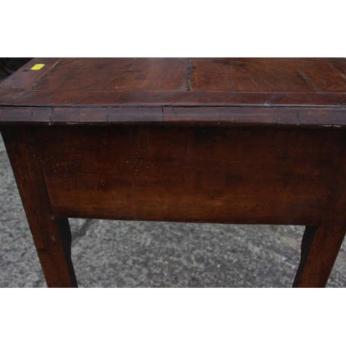 509 - An 18th century walnut side table, fitted two drawers, on chamfered supports, 32