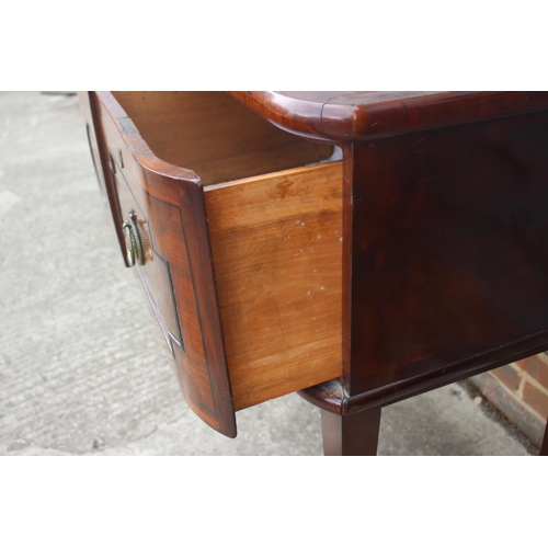 522 - A 19th century mahogany and ebony strung cross banded break bowfront sideboard, fitted two drawers, ... 