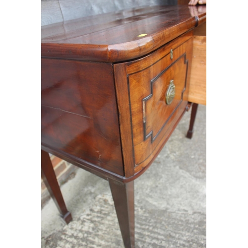 522 - A 19th century mahogany and ebony strung cross banded break bowfront sideboard, fitted two drawers, ... 