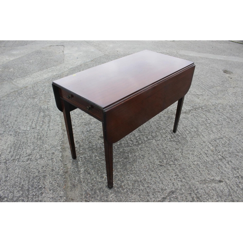 524 - A 19th century mahogany and boxwood line inlaid Pembroke table, fitted one drawer, on square taper s... 