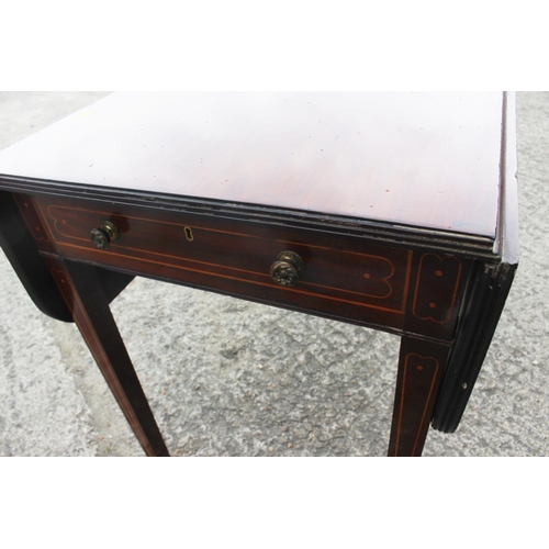 524 - A 19th century mahogany and boxwood line inlaid Pembroke table, fitted one drawer, on square taper s... 