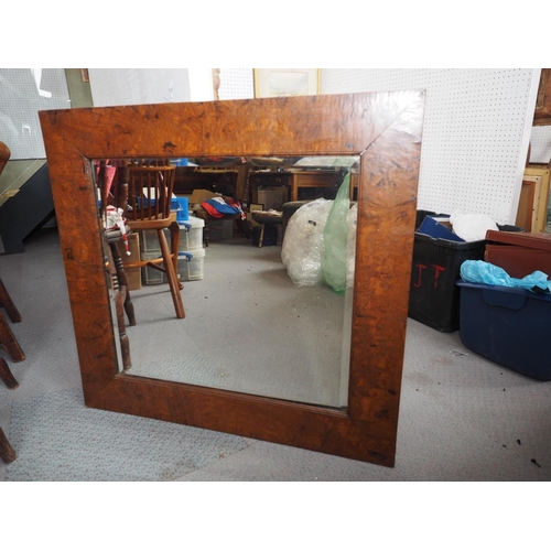 535 - A burr walnut framed wall mirror, bevelled plate 24