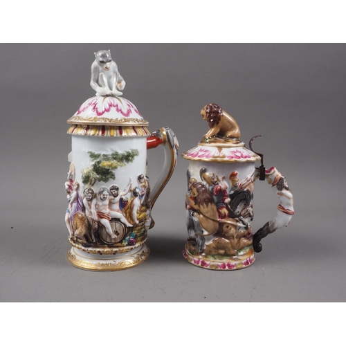 54 - Two Capodimonte tankards and covers, with classical figure decoration, 9