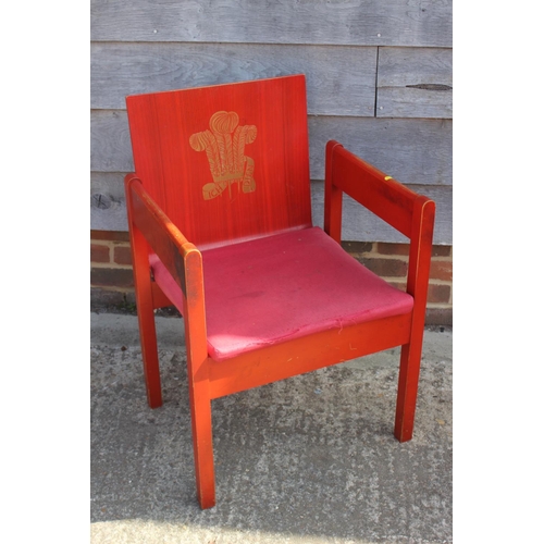 561 - Two 1969 Prince of Wales investiture red lacquered chairs with later upholstery (arms worn)