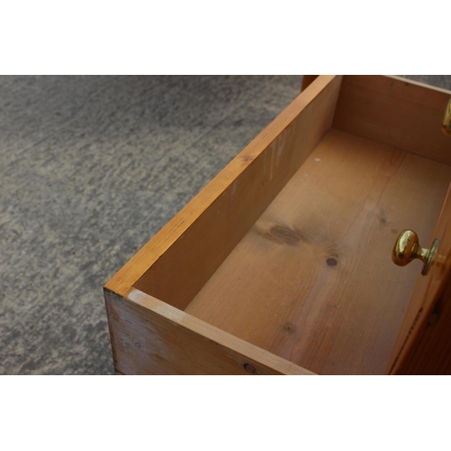 613 - An 18th century Oregon pine chest, fitted four graduated drawers over two small drawers and cupboard... 