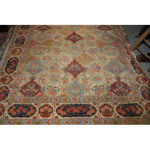 635 - A Persian city rug with all-over floral design on a light blue ground, 122