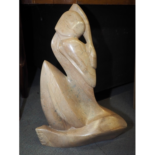 644 - Jorge Gomes: a carved steatite figure, 