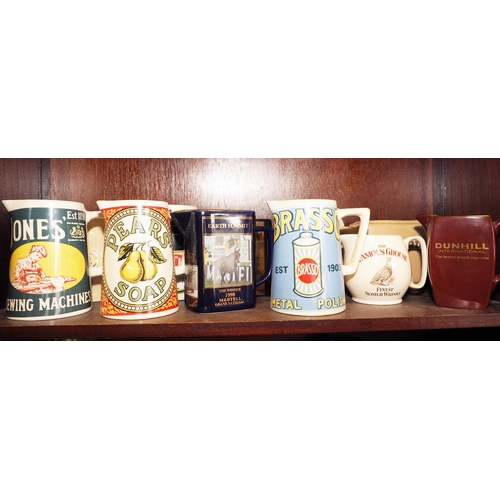 70 - A collection of advertising related whisky water jugs, including Pears Soap, Swan Ink, Dunhill Inter... 