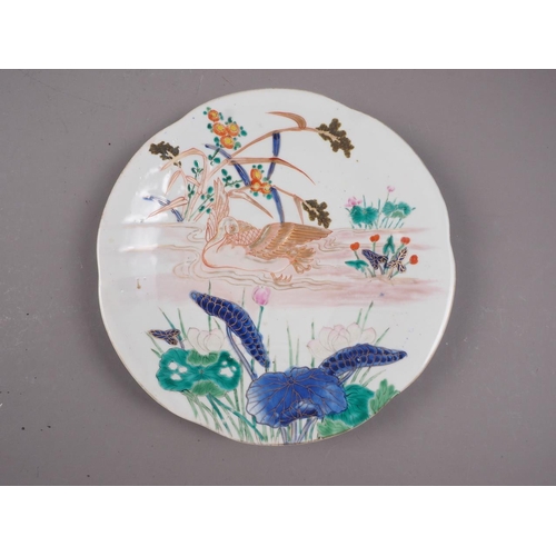 90 - An Imari dish with traditional decoration, 12