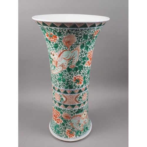 94 - A Chinese porcelain famille verte flared vase, decorated Dogs of Fo and Arabesques, 18