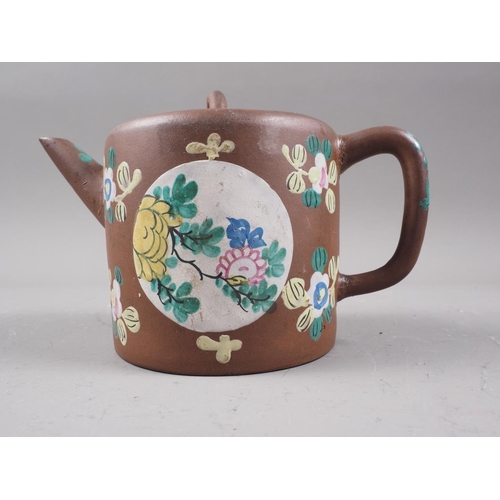 97 - A Chinese Yixing teapot with relief floral decoration, 4 1/4