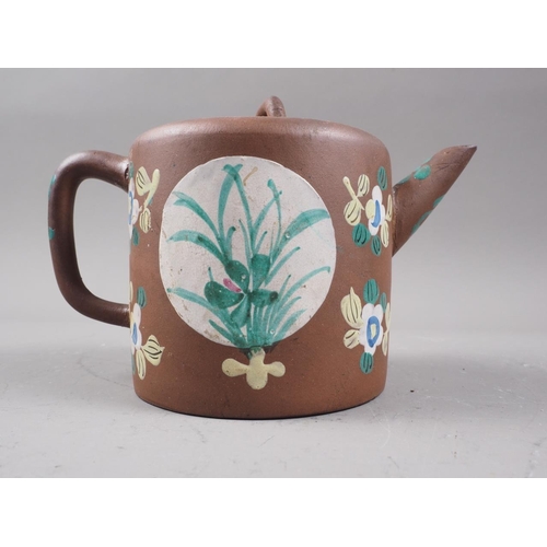 97 - A Chinese Yixing teapot with relief floral decoration, 4 1/4