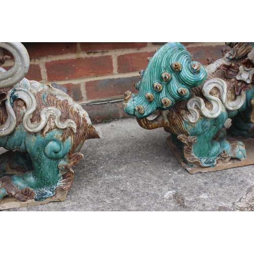 116 - A pair of Chinese glazed pottery Dogs of Fo, 19