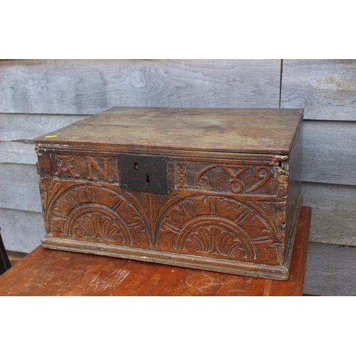 181 - A largely 17th century boarded oak box, monogrammed A N 1689, 21