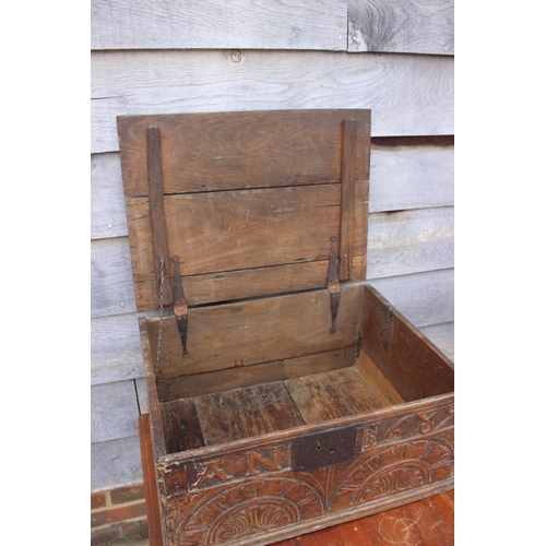 181 - A largely 17th century boarded oak box, monogrammed A N 1689, 21