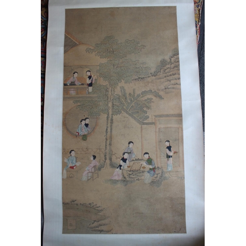 453 - A Chinese watercolour on linen scroll, women in a court garden, 36 3/4