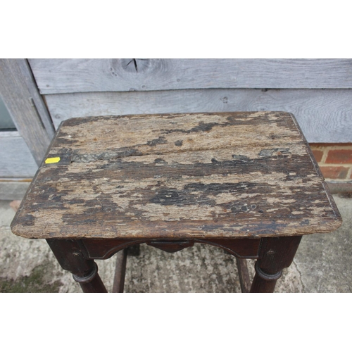 512 - A largely 17th century oak joint stool, on turned and stretchered supports, 18