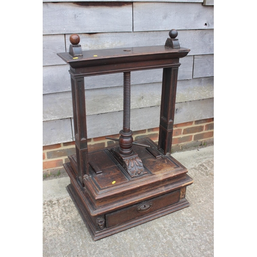 514 - An early 19th century carved oak book press with acanthus scrolls, on stand, 37