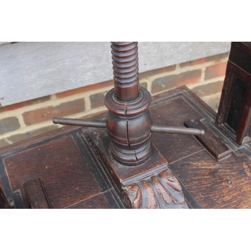 514 - An early 19th century carved oak book press with acanthus scrolls, on stand, 37