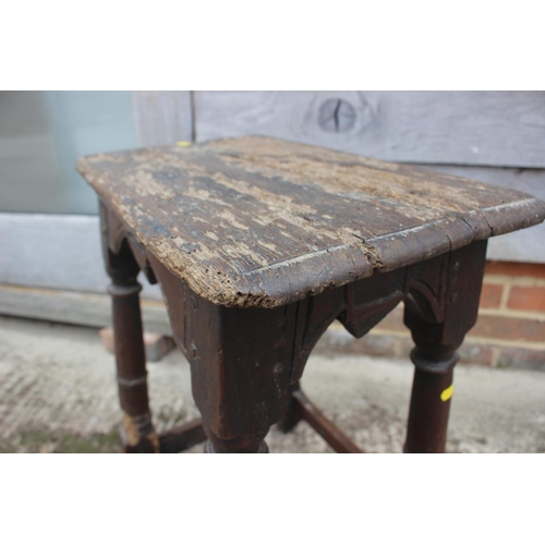 521 - A Regency/William IV rosewood and banded brass inlaid circular top table, on turned column and tripo... 