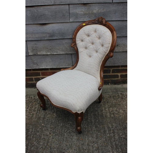 532 - A gentleman's Victorian carved walnut showframe elbow chair and lady's matching chair, upholstered i... 